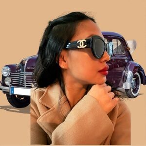 CHANEL Black Sunglasses with Gold Logo